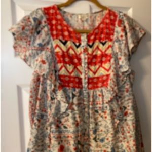 Cap sleeve with ruffle. Very soft flowy fabric